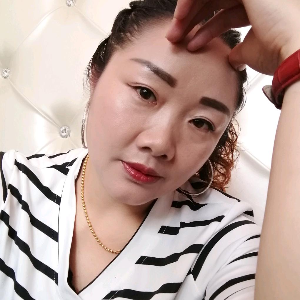 张二妹，卖饲料包谷