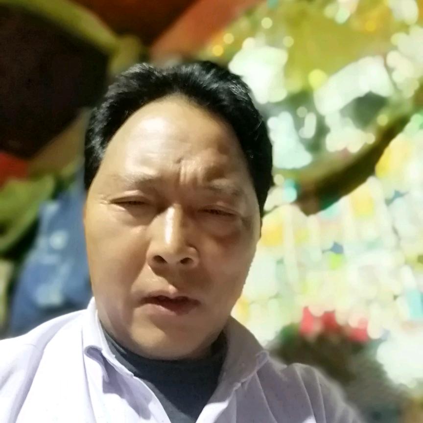梁龙均