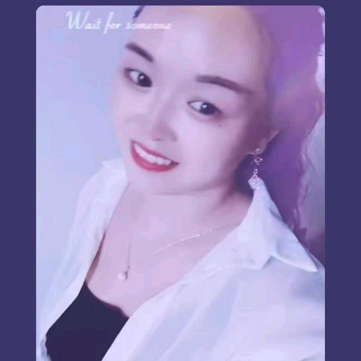 妮.