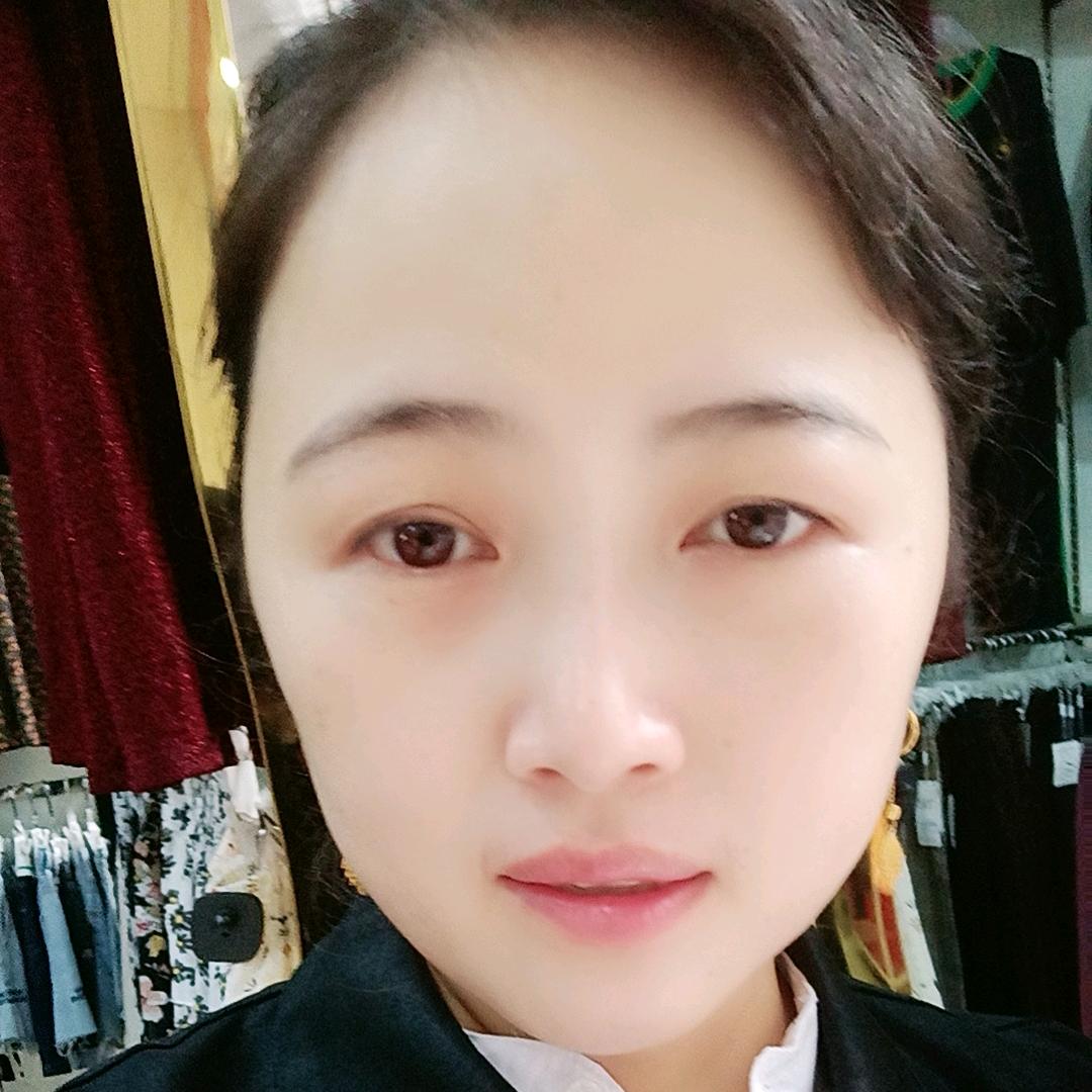 淡然一笑