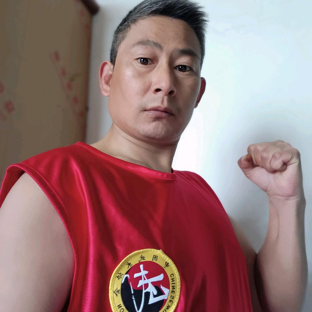 弓哥