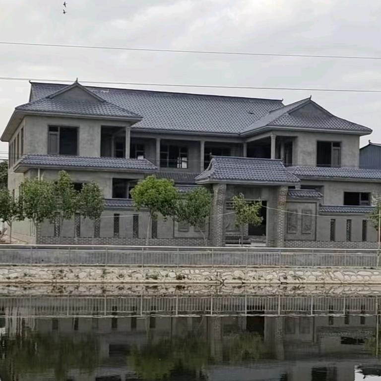 平舆县旭航钢架琉璃瓦专业屋顶造型设计施工