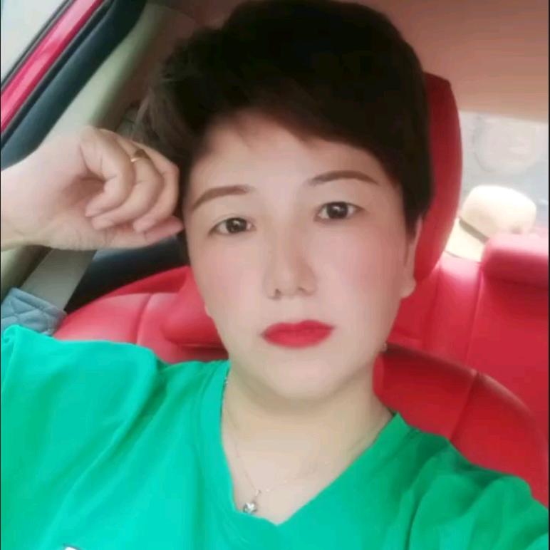 张摊主