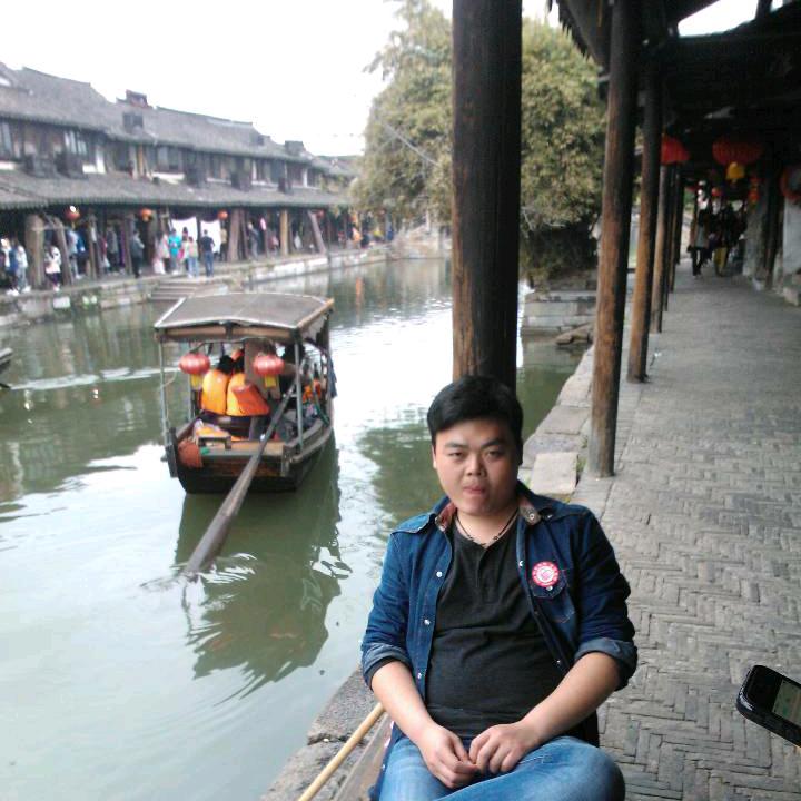 村口烫头小李