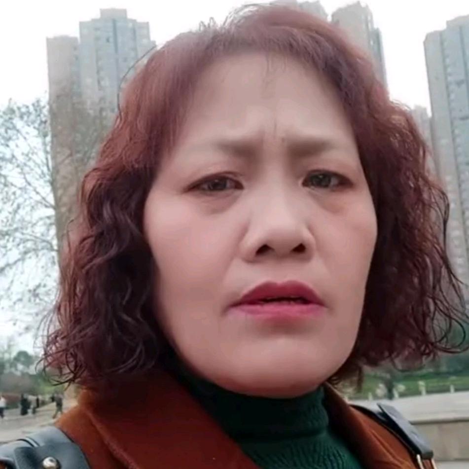 罗大姐。