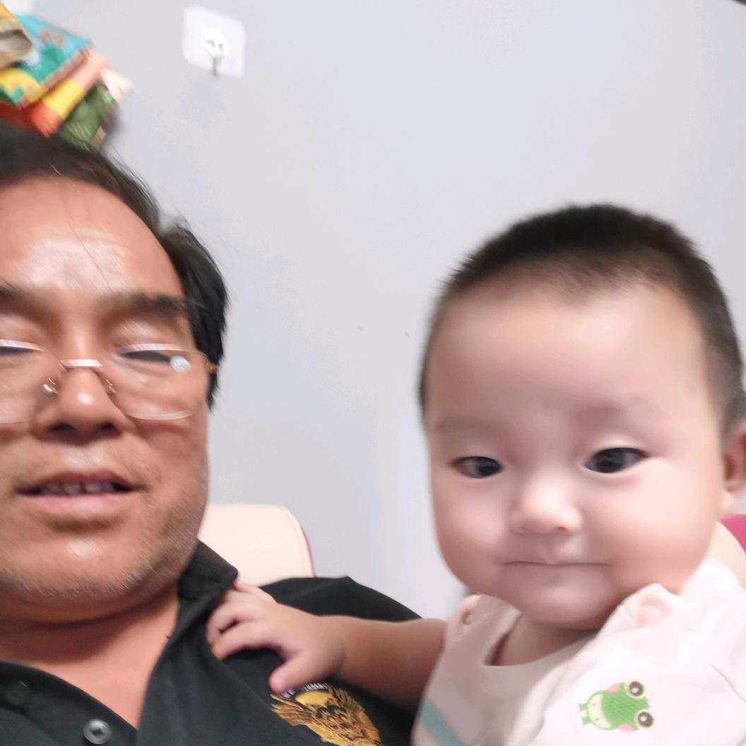 老张