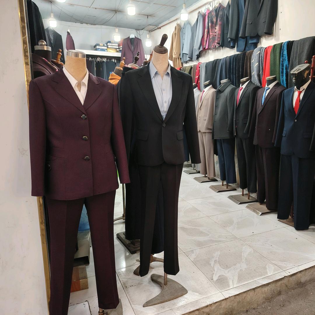 黔西市蒋胡子西服店