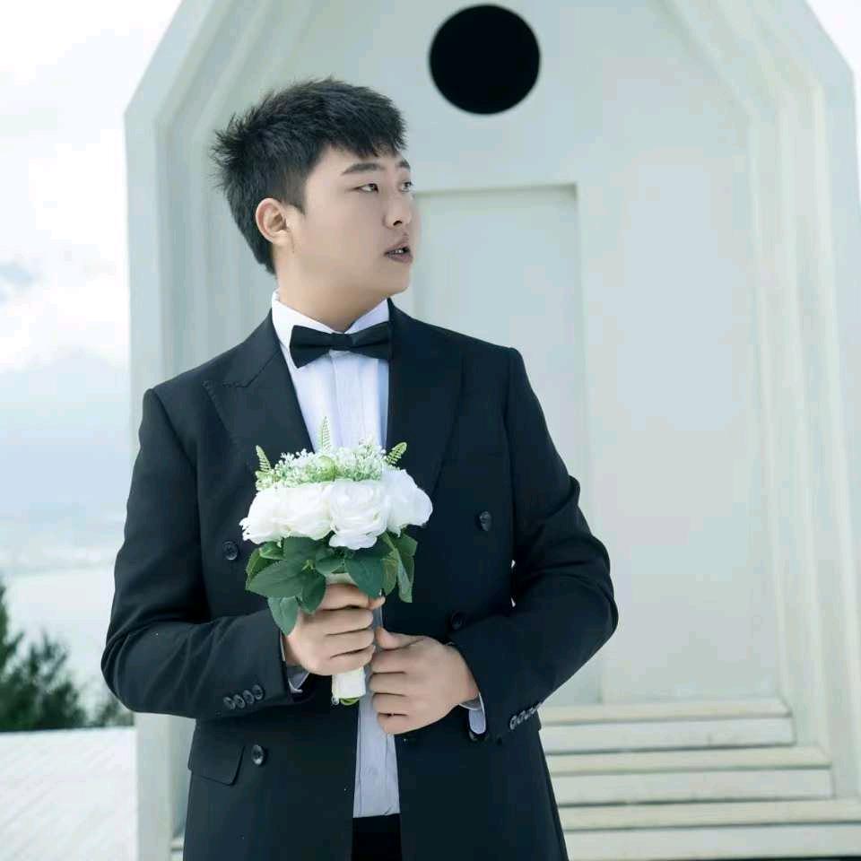 贾..