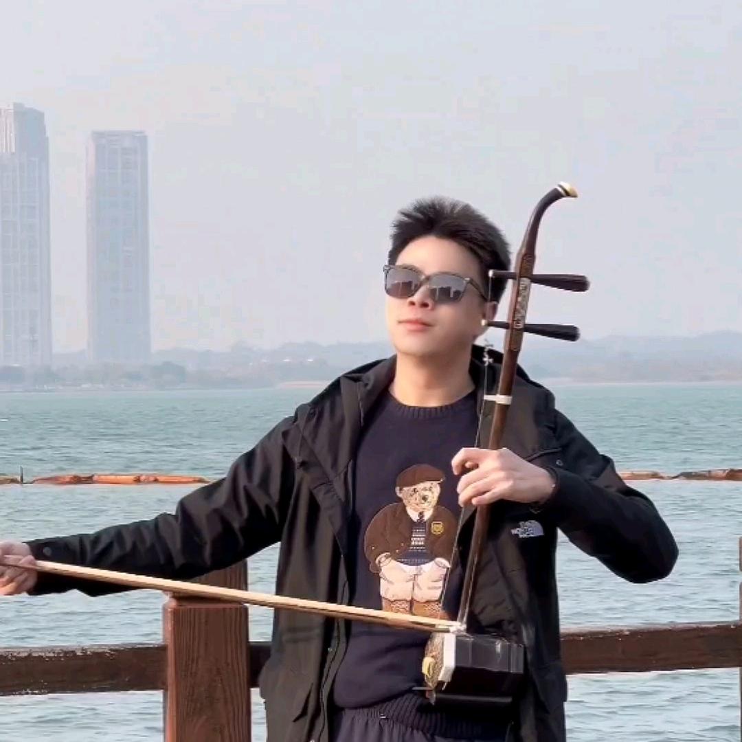 琴者