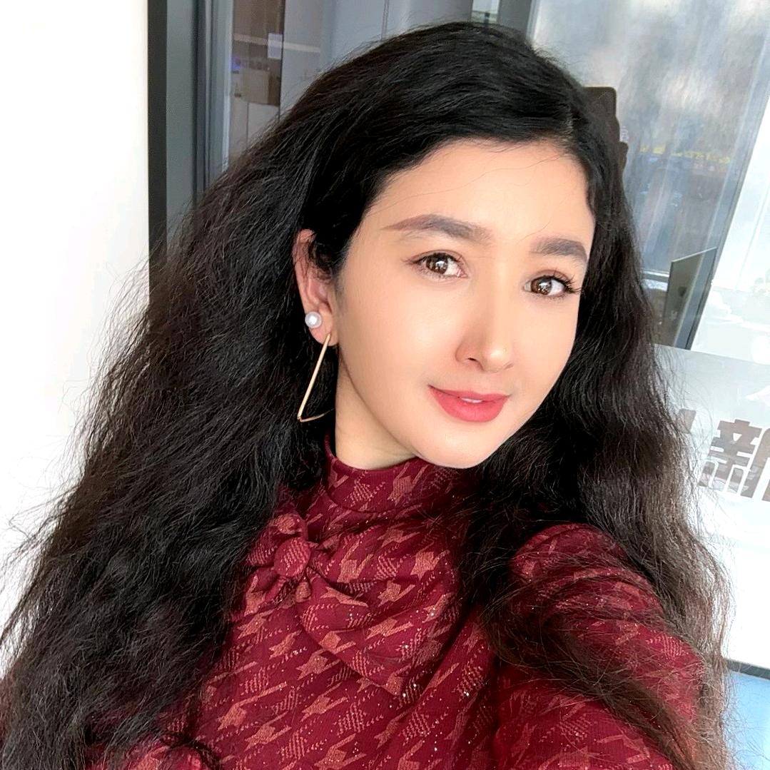 古姐