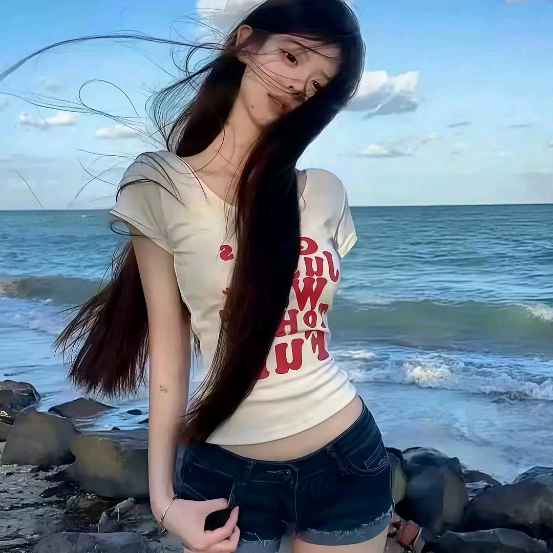 欣.
