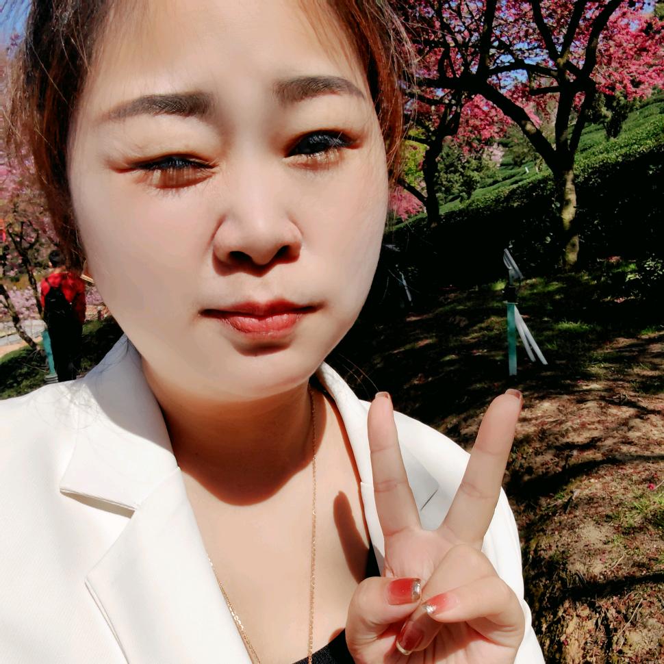 王华美