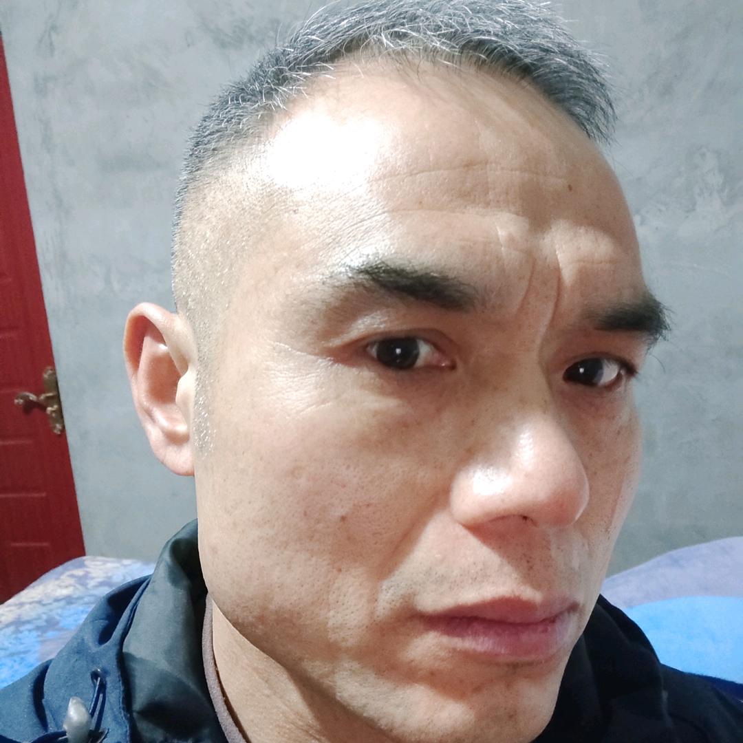 老张
