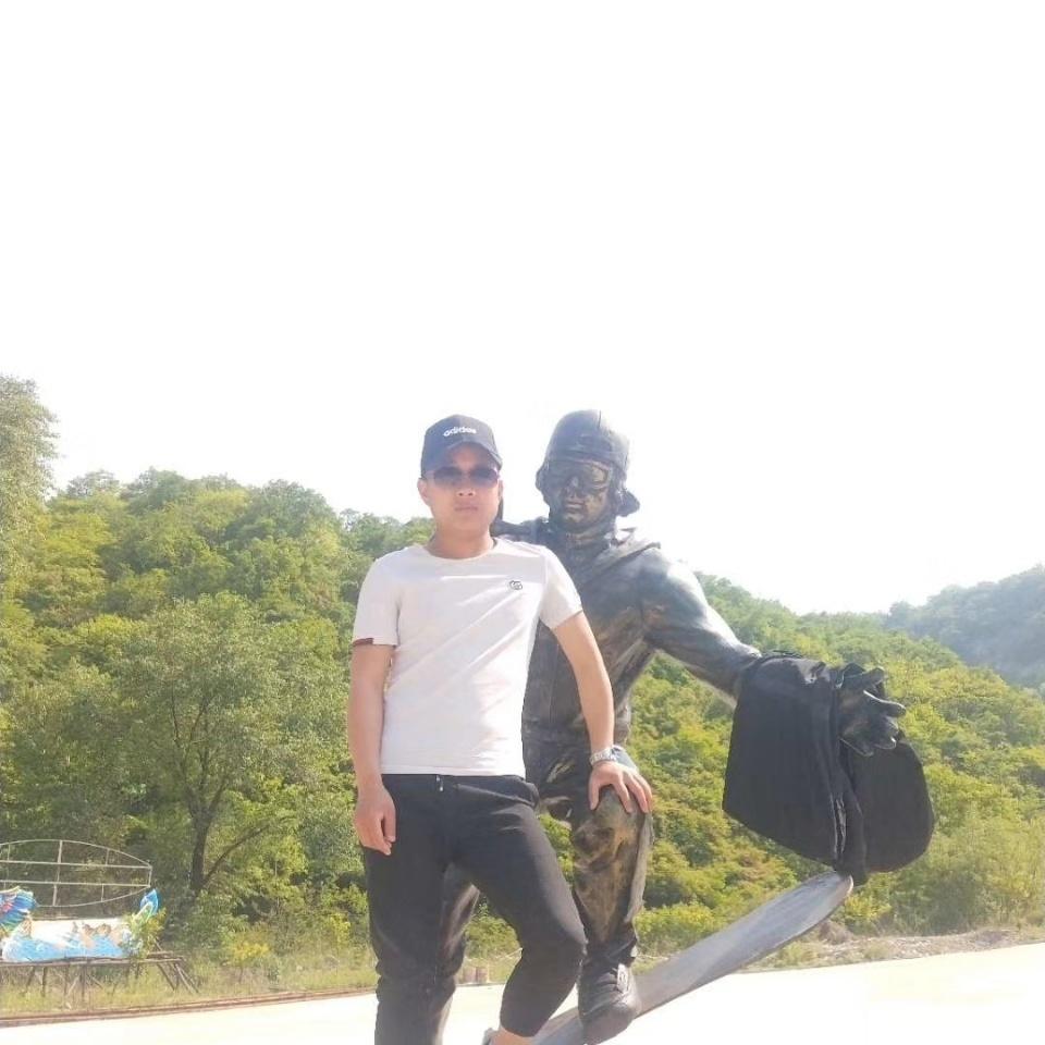 @言覃
