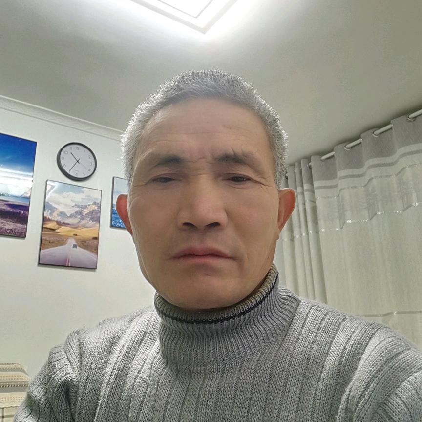 老何