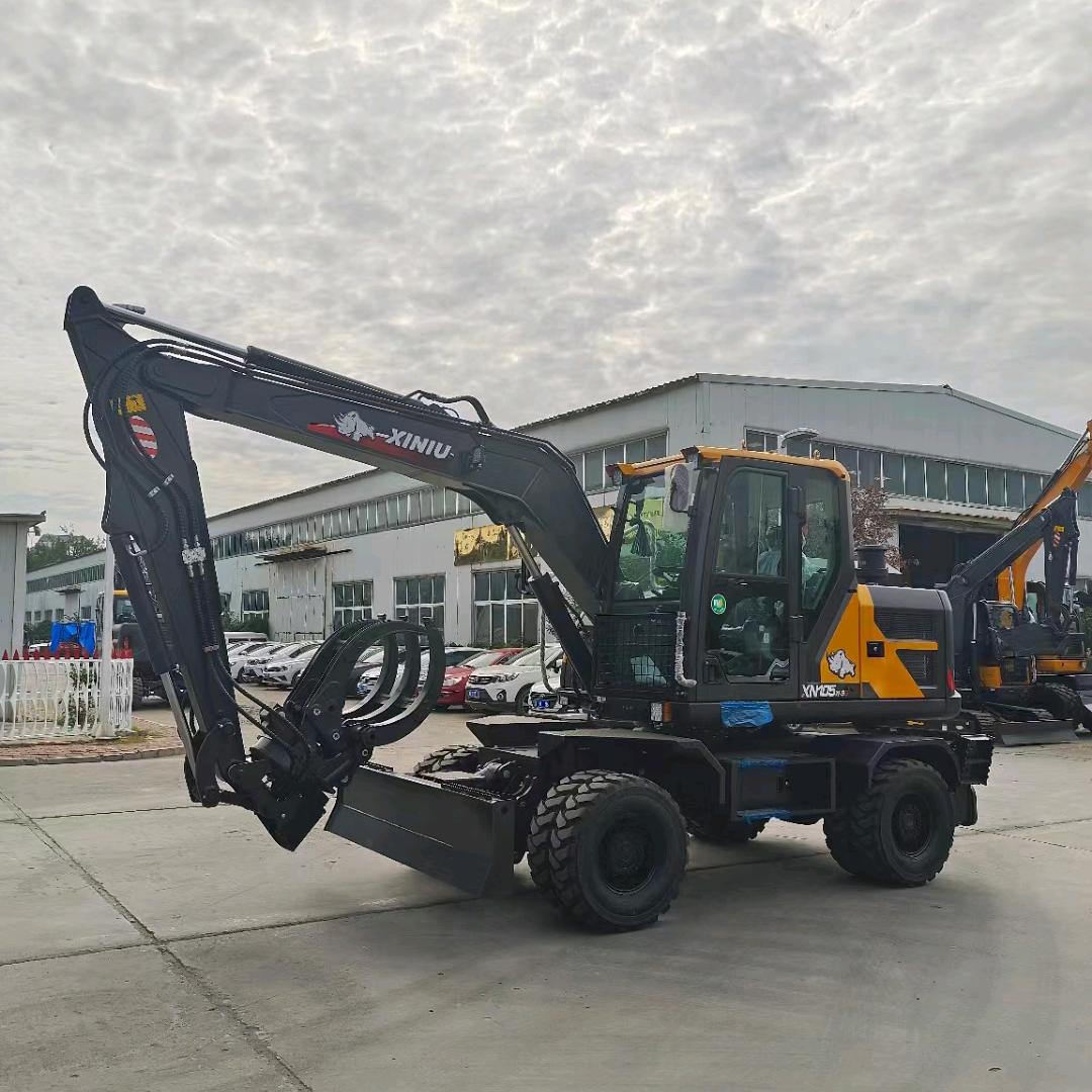 吕永响二手轮式挖机夹木机