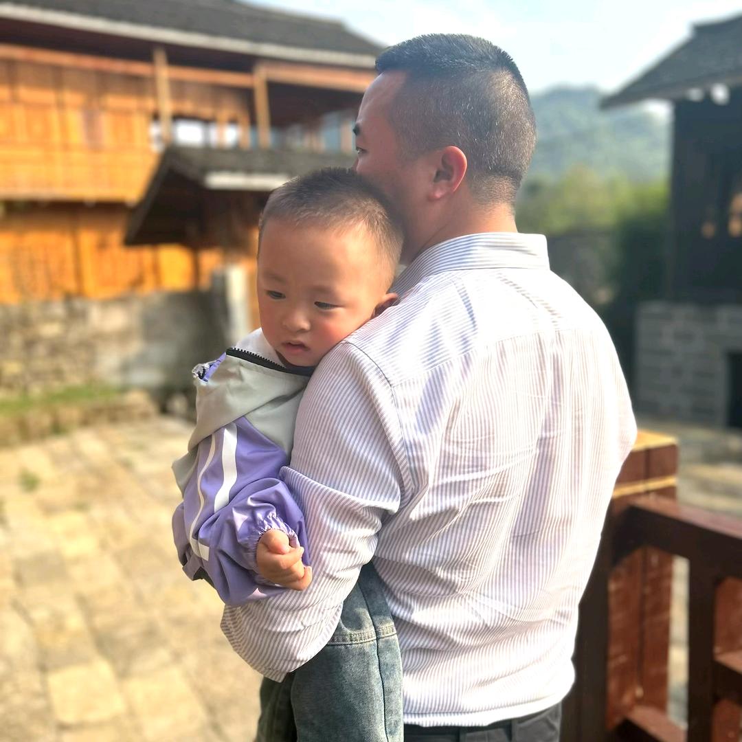 肖奕成他爸