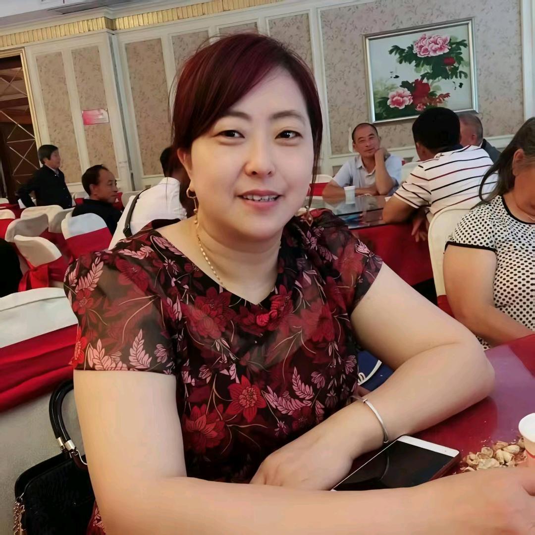 覃五