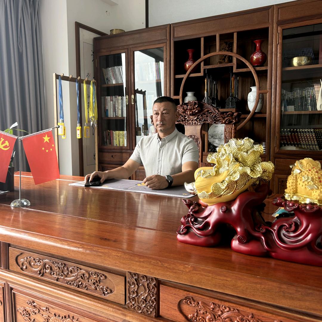 防城港良久房地产  张志刚