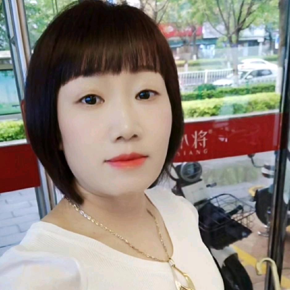 淡然一笑