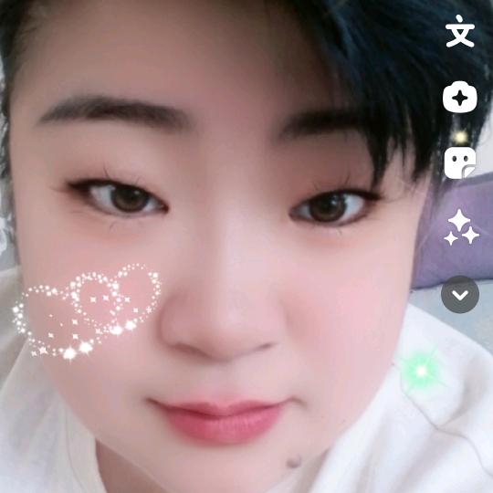 嫣然一笑