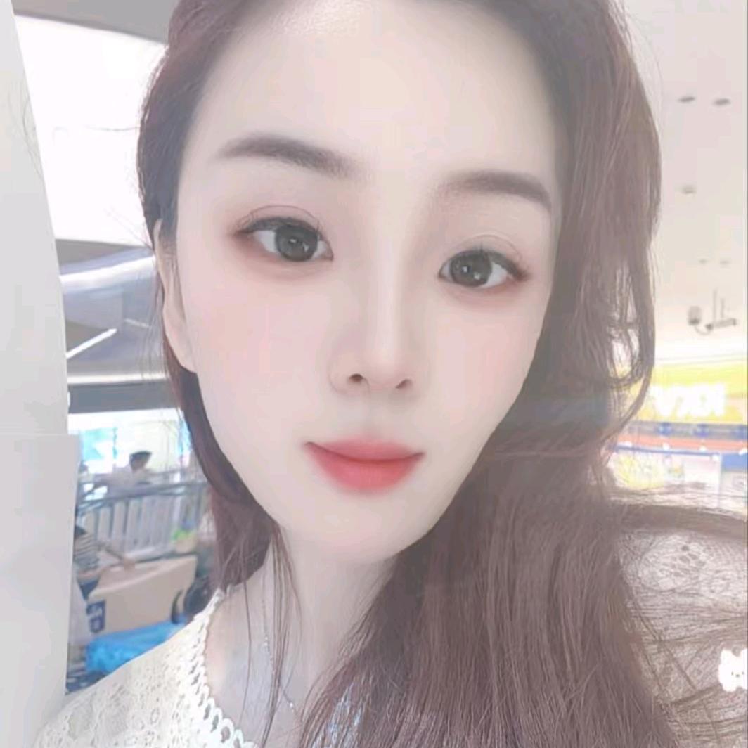 嫣然