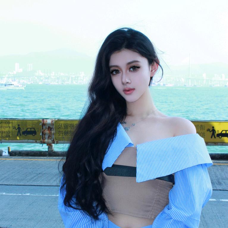 新田真希子