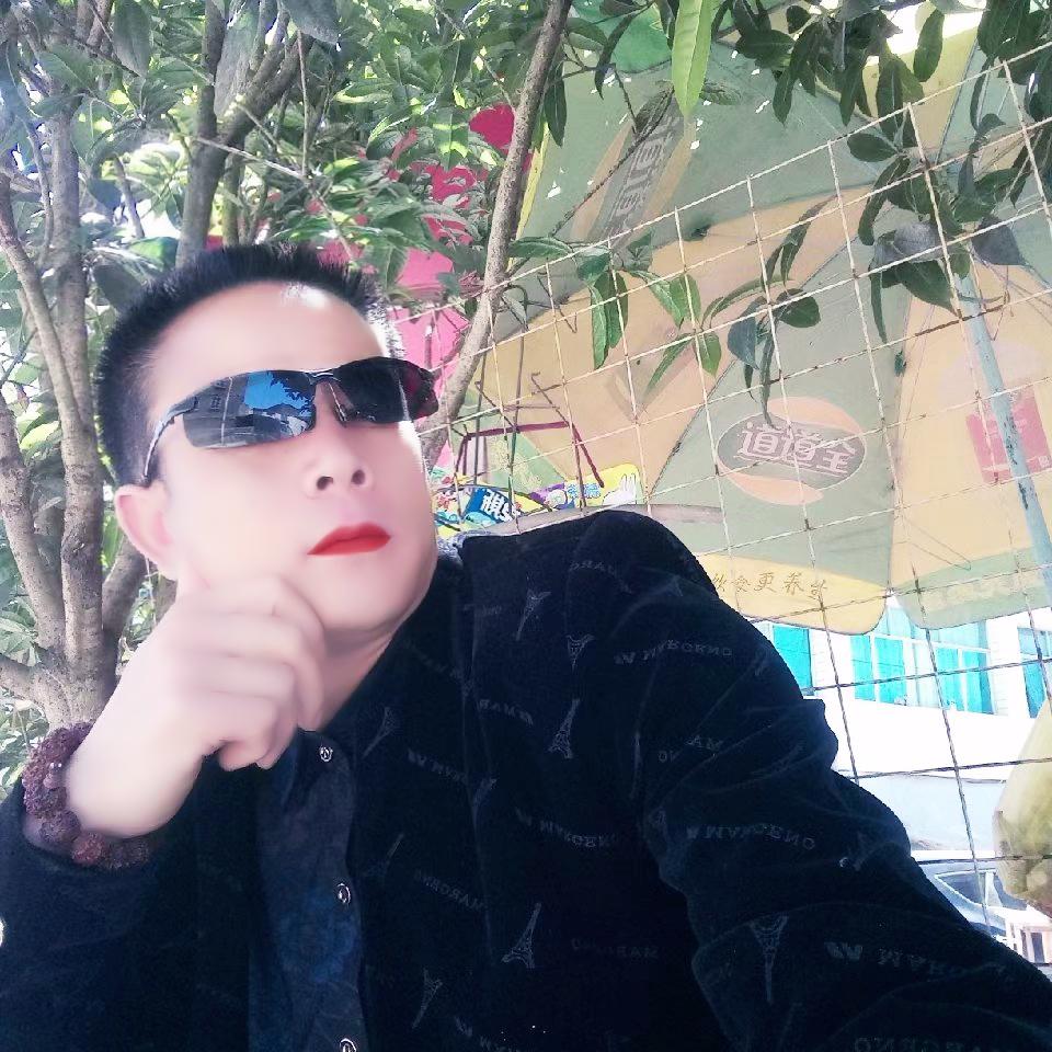 𣑯花依旧笑春風