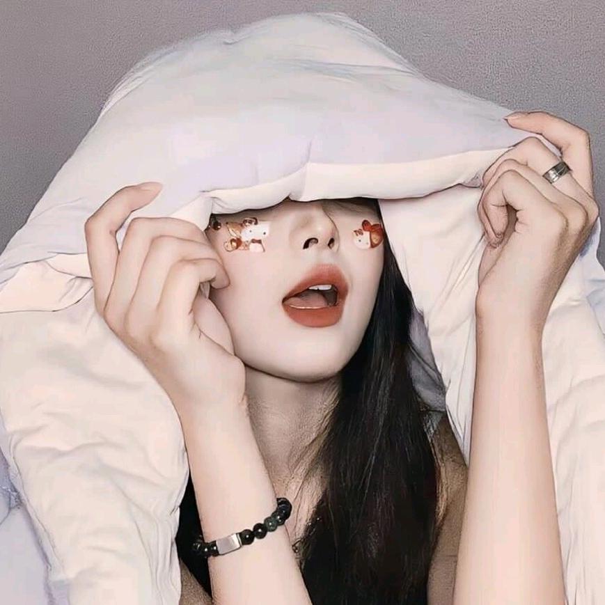 Z张༰