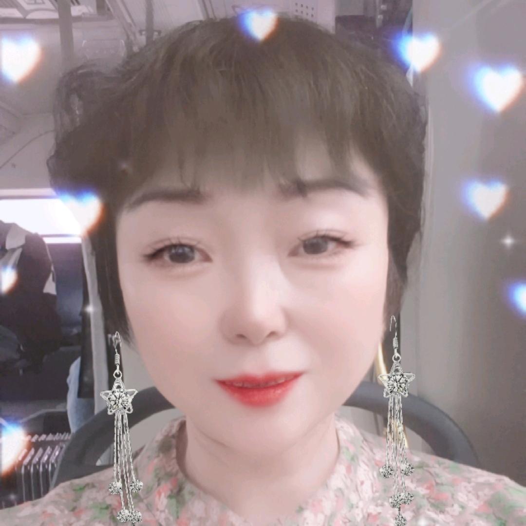 自由人李桂芝。