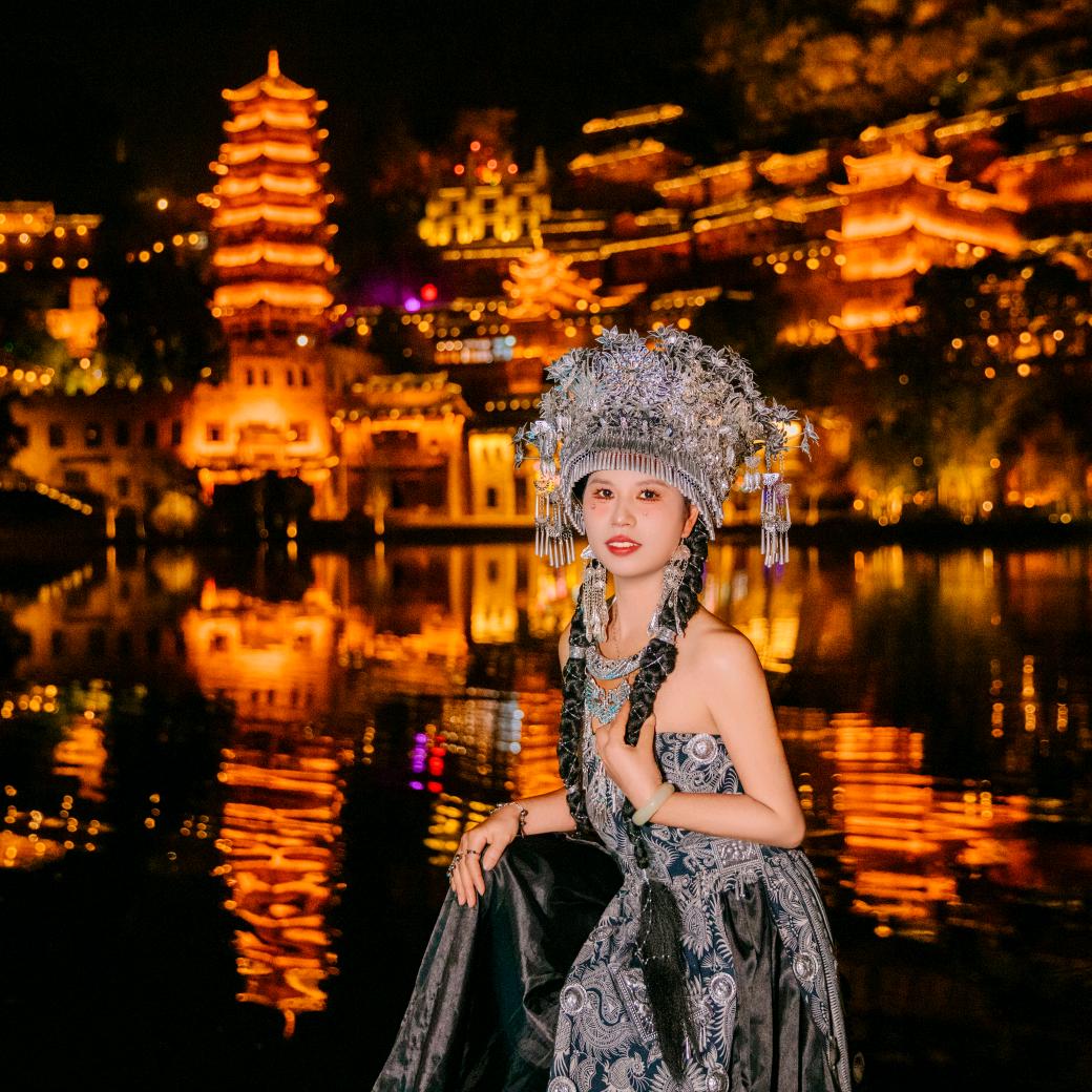 谭维维'@