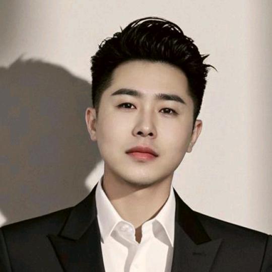 李哲:
