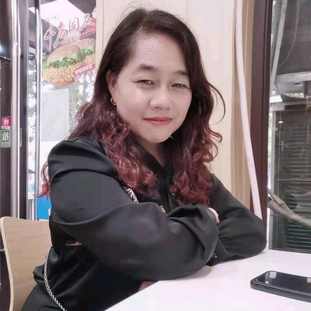 淡然一笑