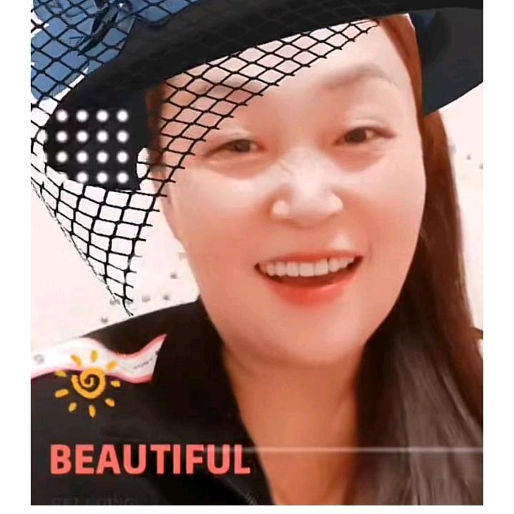 雍明英
