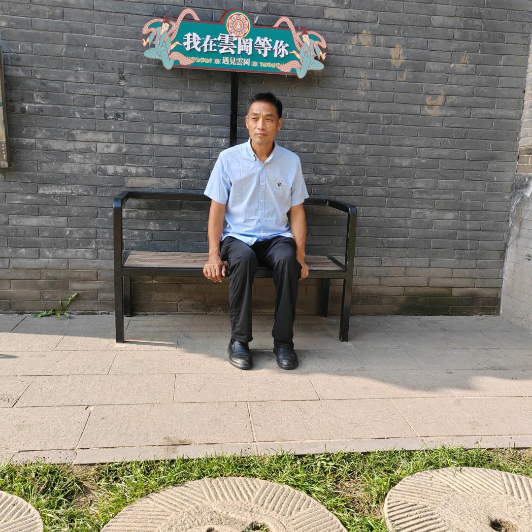都城建民