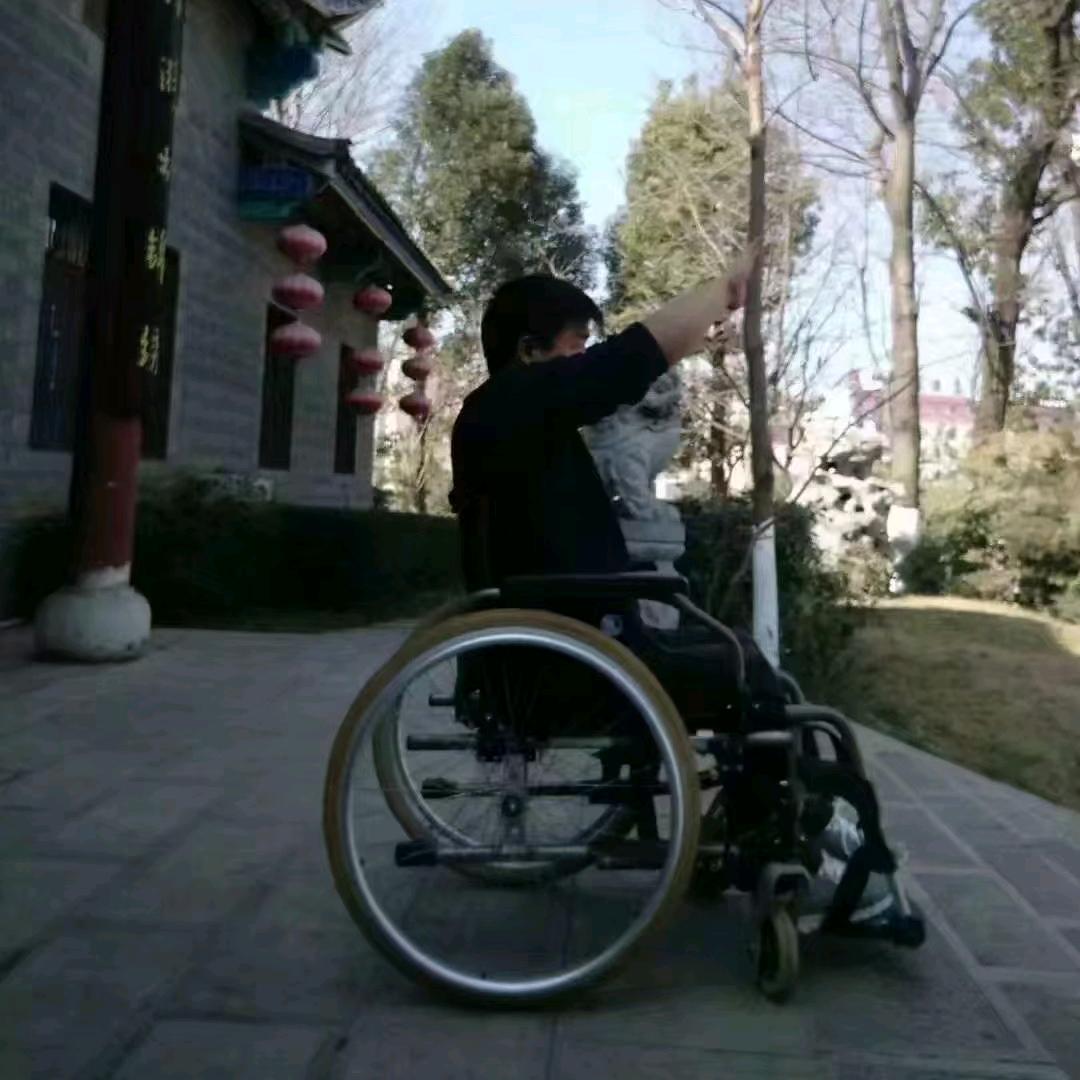 轮椅少年FB