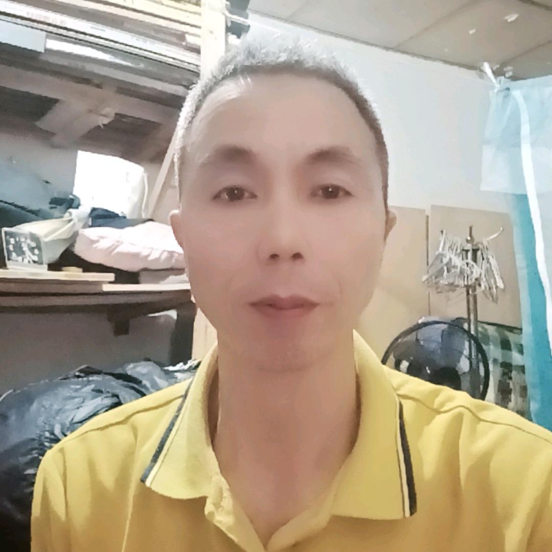 担当