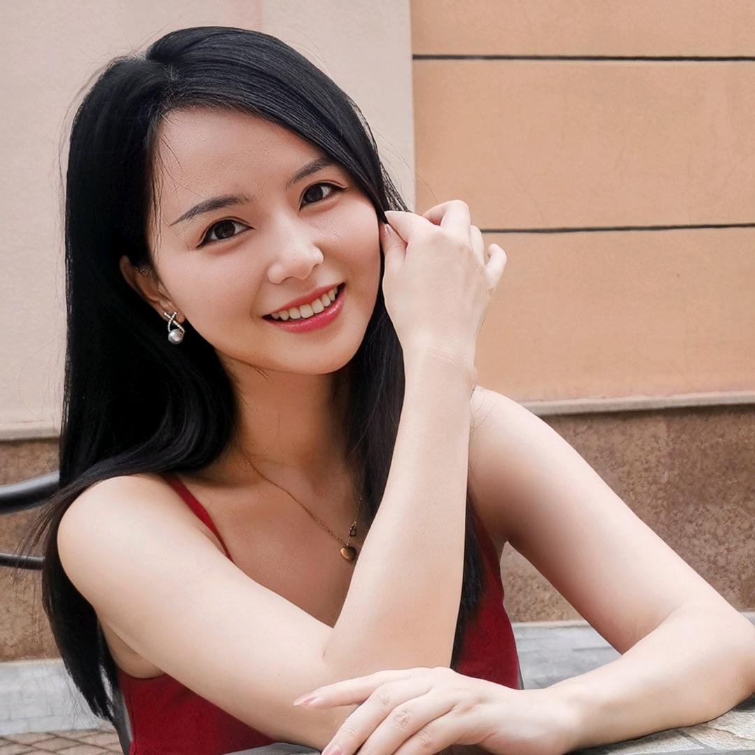 柒柒.
