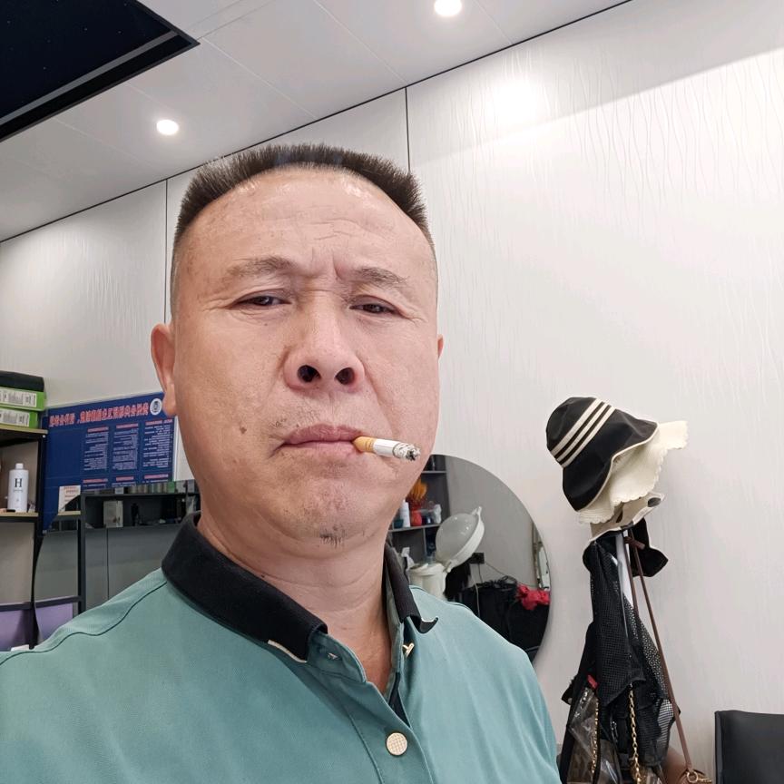 王明富，幺哥