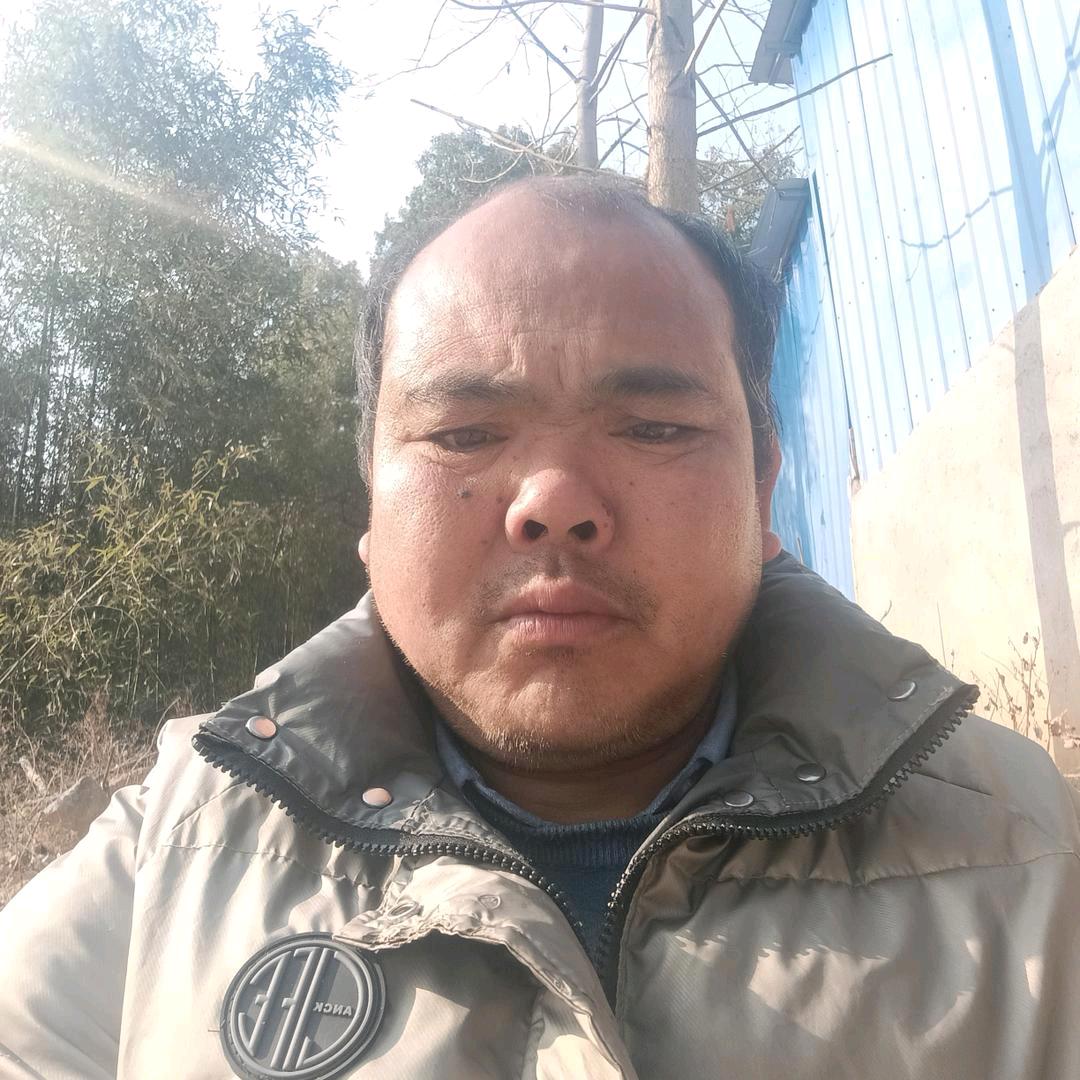 老张