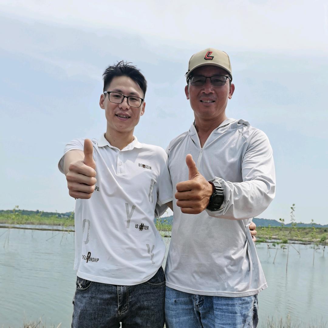 覃海龙（饵轻松鲢鳙定量压饵器）