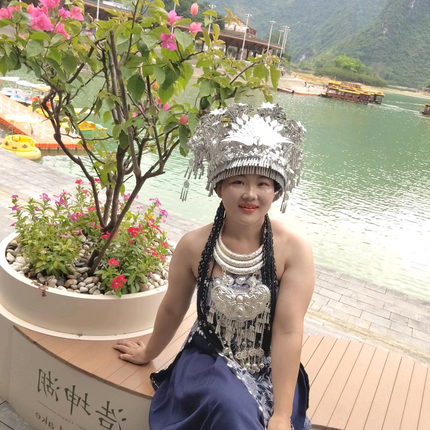 谭某某