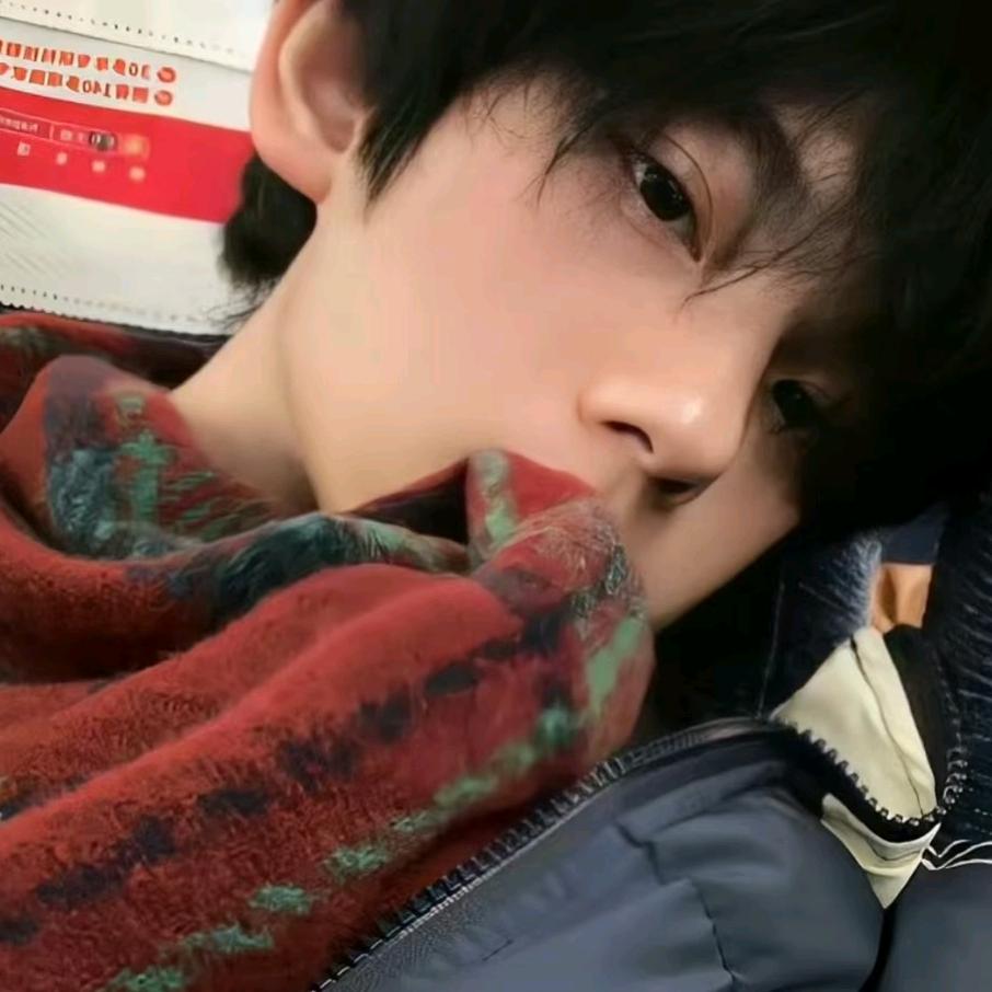劉~