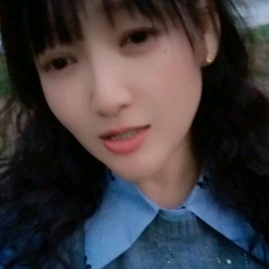 李美美.