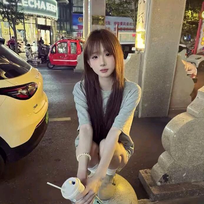 琦^