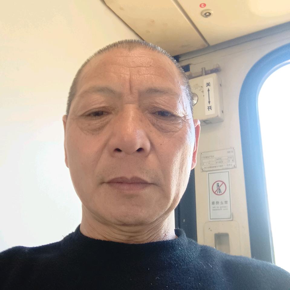 邱业明