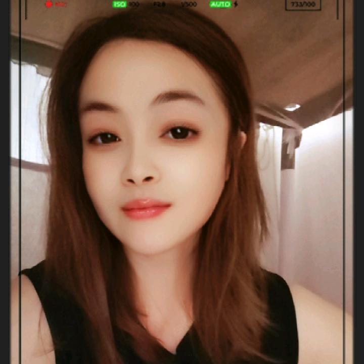 淡然一笑