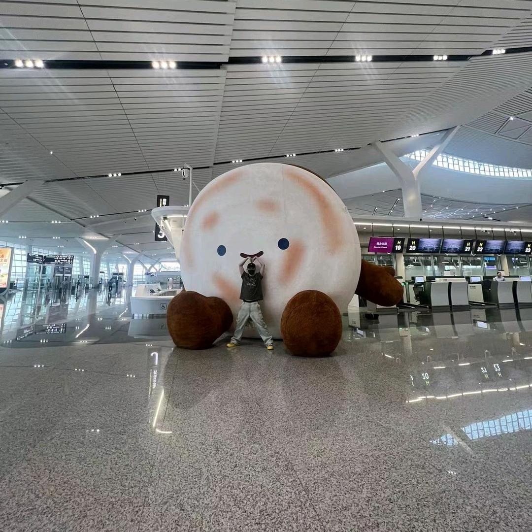 大头小咩