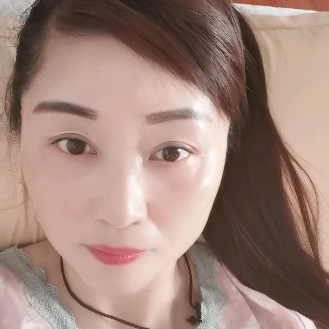 芳念伟
