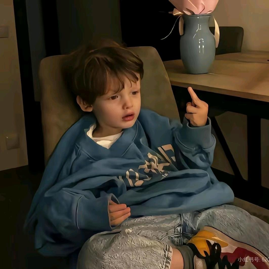 T.